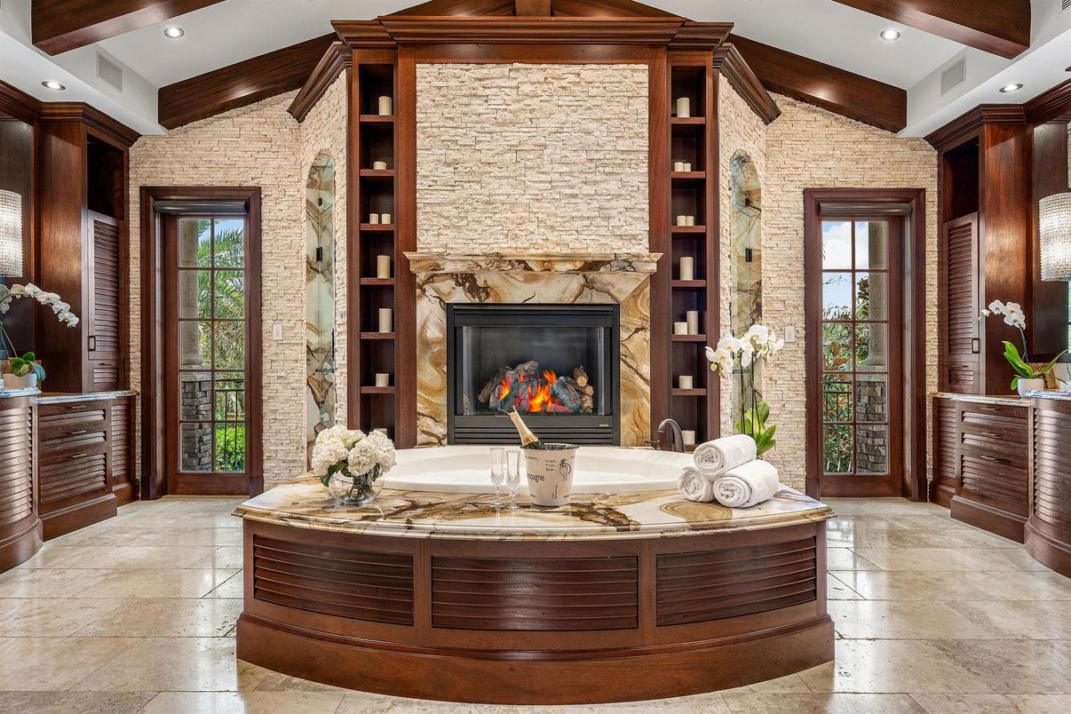 Fireplace, Hot Tub, Interior, Recessed Lighting, Stone Walls, Wooden Beams