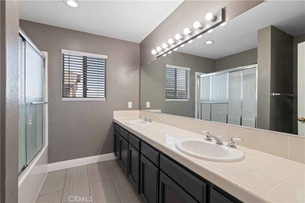 Bathroom, Dual Sink Vanities, Glass Shower, Interior, Recessed Lighting, Tile Countertops