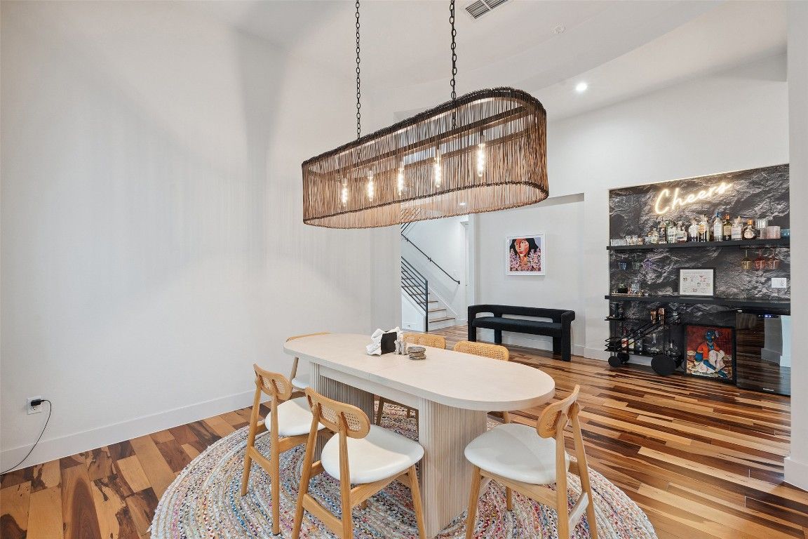 Dining room, Fireplace, Interior, Pendant Lights, Recessed Lighting, Wood Texture Flooring