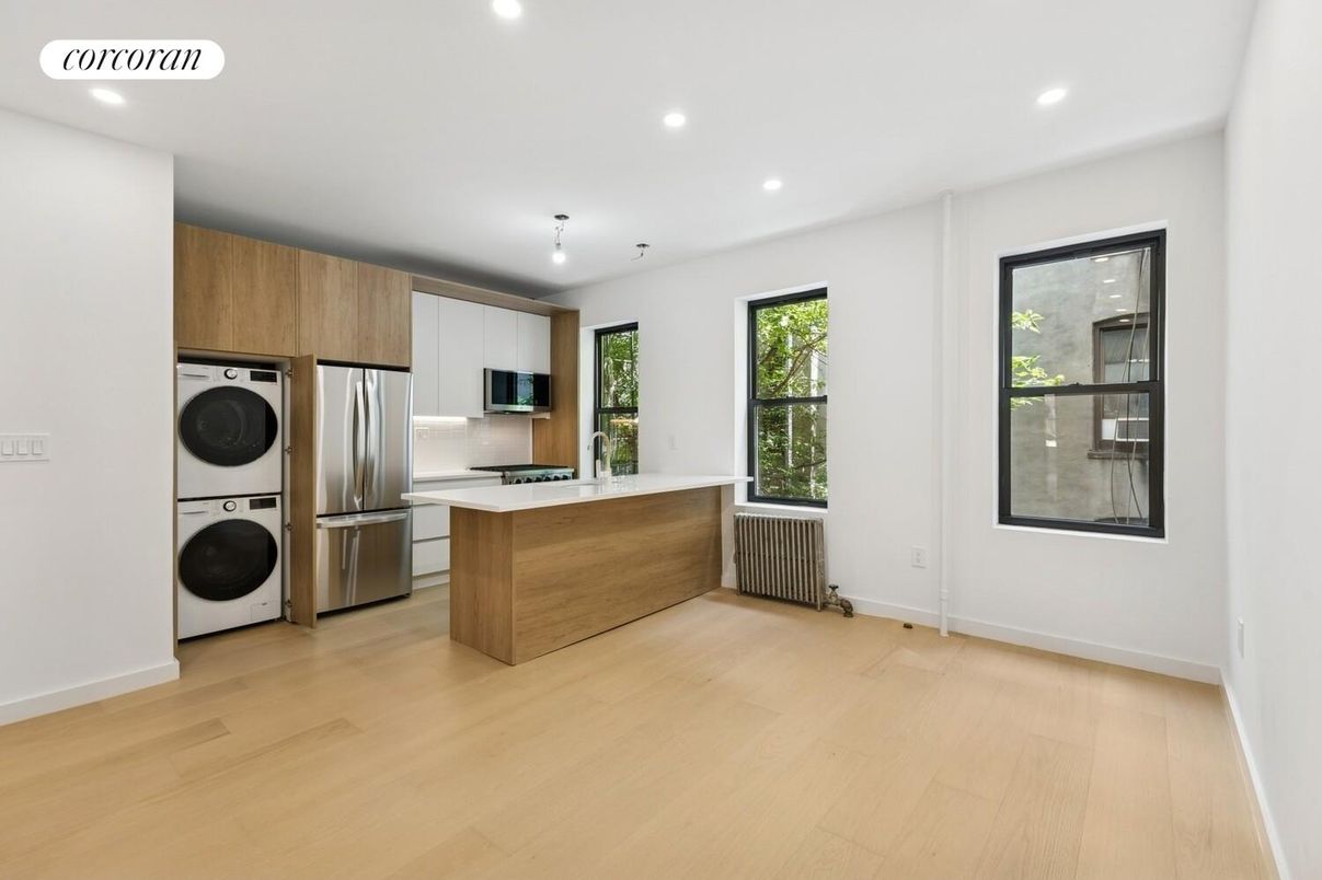 Interior, Kitchen, Recessed Lighting, Stainless Steel Appliances, Washer, Wood Texture Flooring