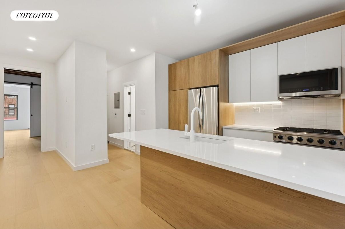 Interior, Kitchen, Recessed Lighting, Stainless Steel Appliances, Wood Texture Flooring