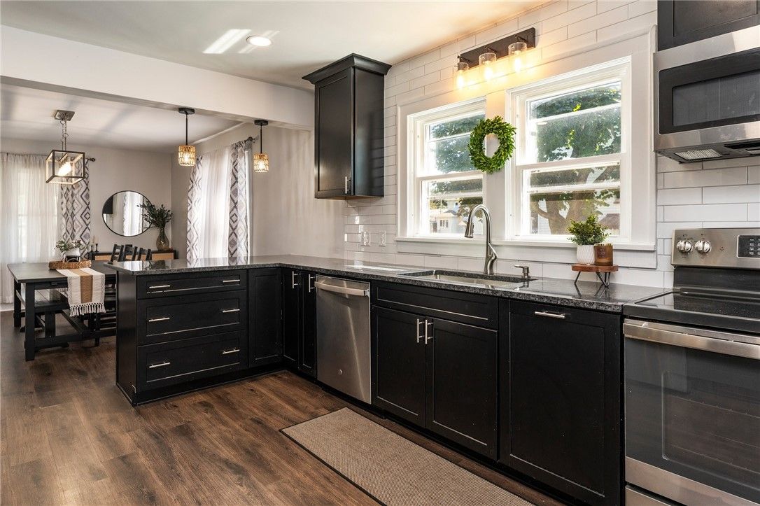 Dining room, Interior, Kitchen, Pendant Lights, Recessed Lighting, Stainless Steel Appliances, Wood Texture Flooring