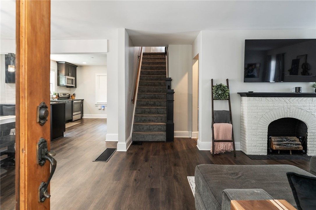 Fireplace, Interior, Kitchen, Recessed Lighting, Wood Texture Flooring