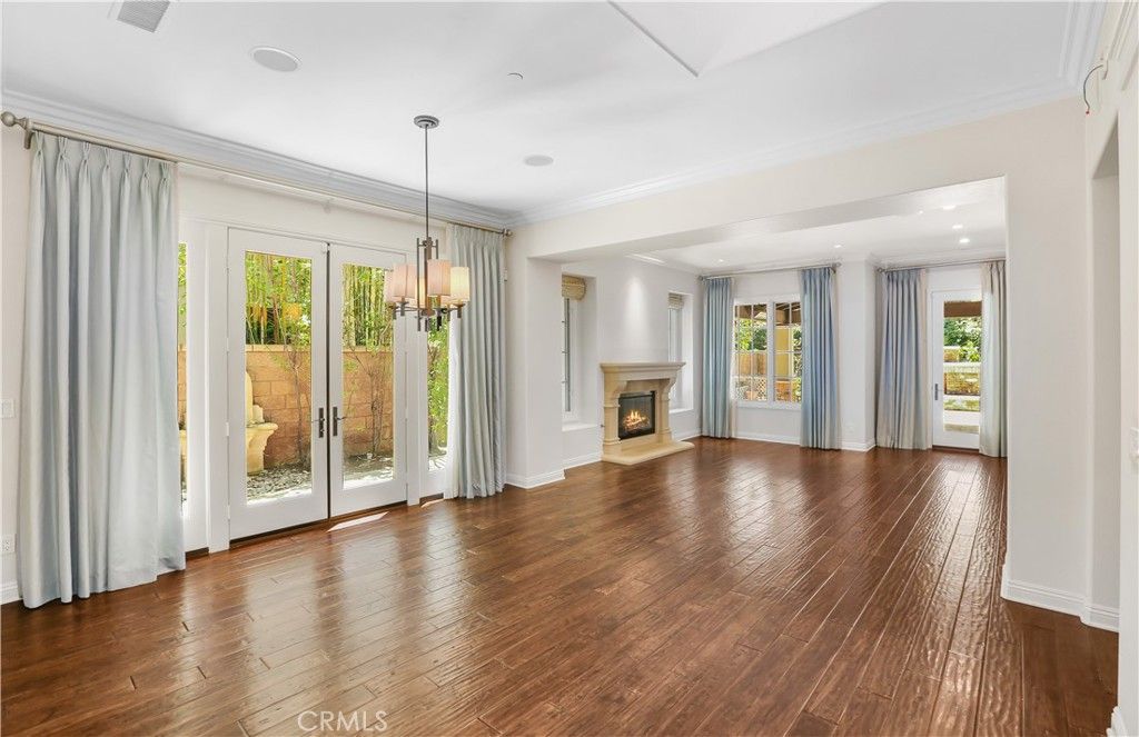 Empty room, Fireplace, Interior, Pendant Lights, Recessed Lighting, Wood Texture Flooring