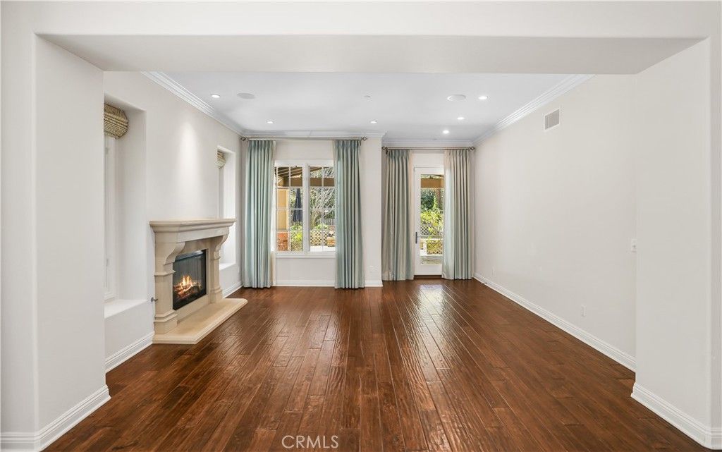 Empty room, Fireplace, Interior, Recessed Lighting, Wood Texture Flooring