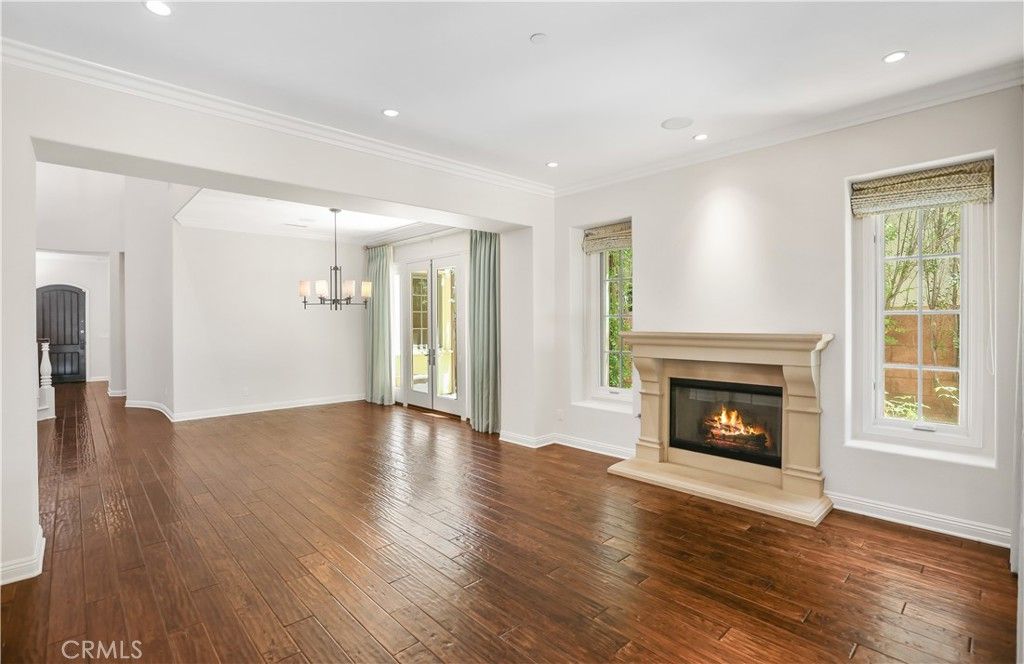 Chandelier, Empty room, Fireplace, Interior, Recessed Lighting, Wood Texture Flooring
