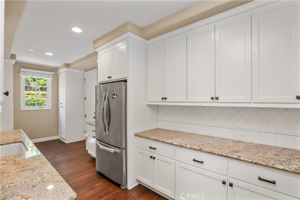 Interior, Kitchen, Recessed Lighting, Washer, Wood Texture Flooring