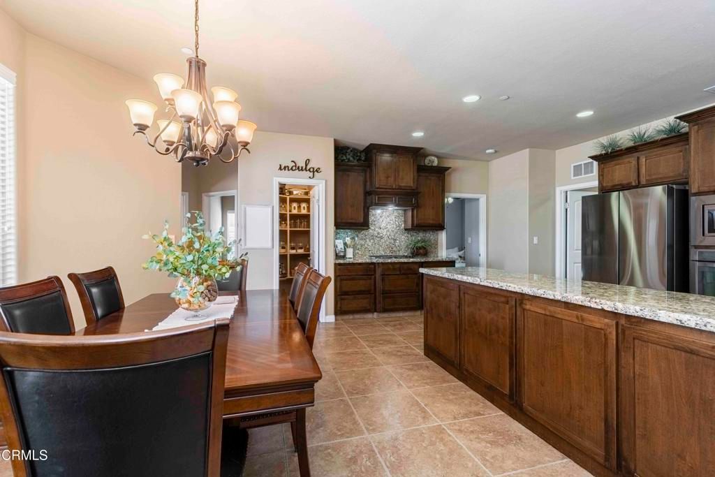 Chandelier, Dining room, Interior, Kitchen, Recessed Lighting, Stainless Steel Appliances