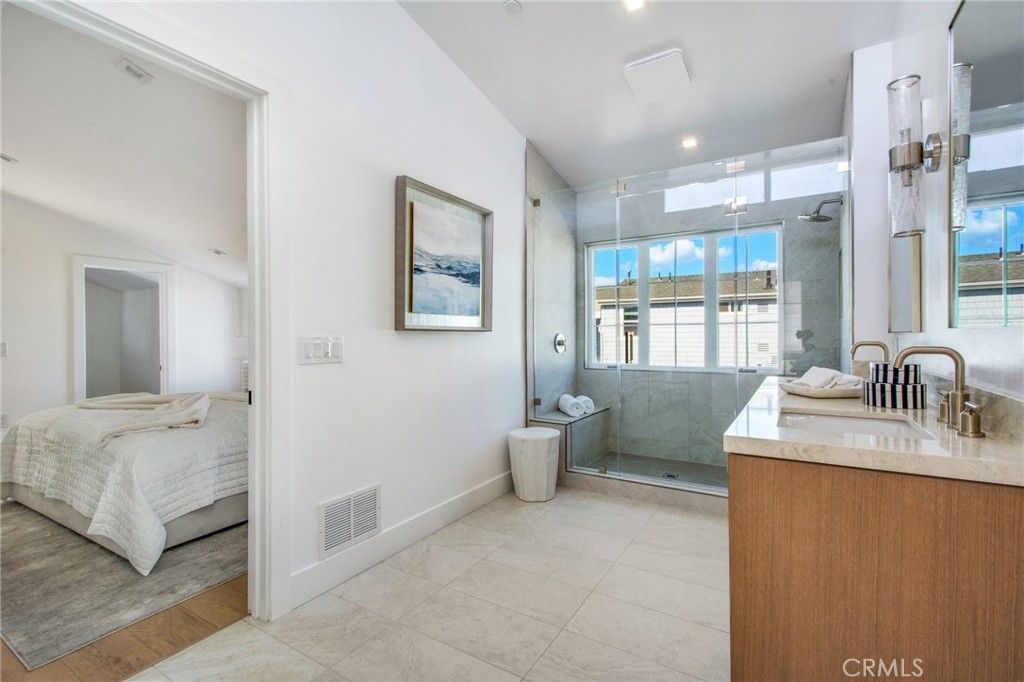 Bathroom, Bedroom, Glass Shower, Interior, Recessed Lighting, Water, Wood Texture Flooring