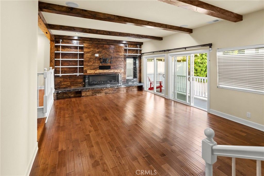 Empty room, Fireplace, Interior, Stone Walls, Wooden Beams, Wood Texture Flooring