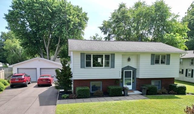 Attached, Detached Garage, Exterior, Facade, Brick Facade, Raised Ranch