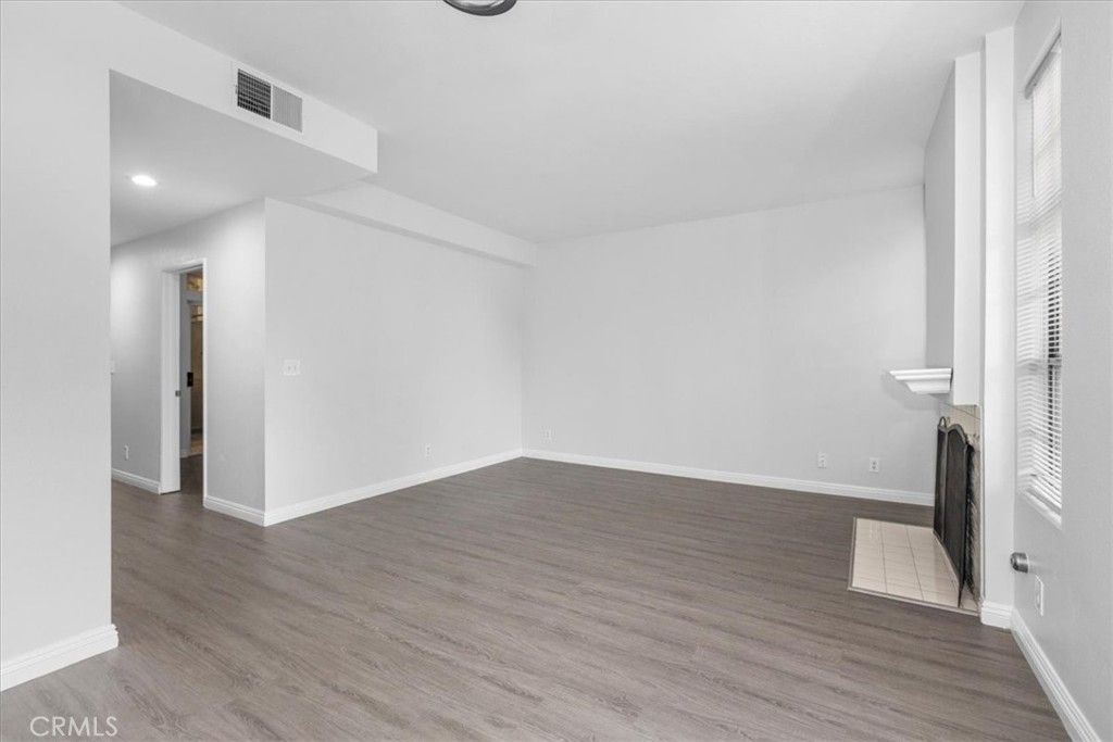 Empty room, Fireplace, Interior, Recessed Lighting, Wood Texture Flooring