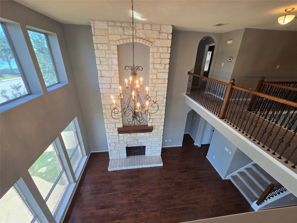 Chandelier, Fireplace, Interior, Stone Walls, Wood Texture Flooring