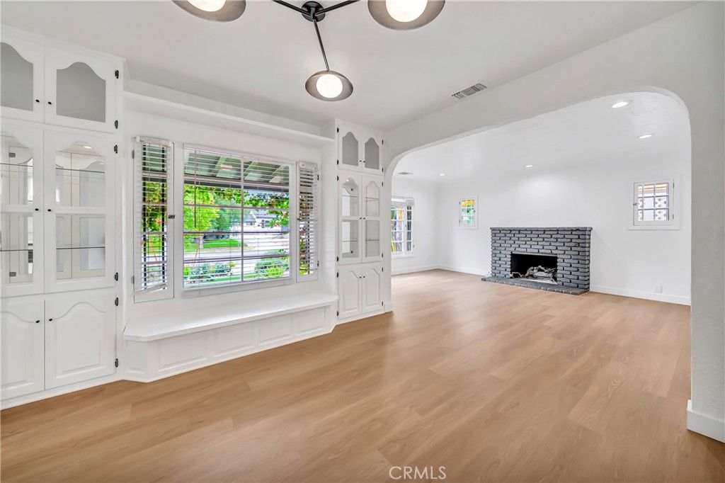 Empty room, Fireplace, Interior, Pendant Lights, Recessed Lighting, Wood Texture Flooring