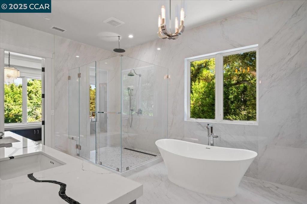 Bathroom, Free Standing Baths, Glass Shower, Interior, Marble, Marble Walls, Pendant Lights, Recessed Lighting