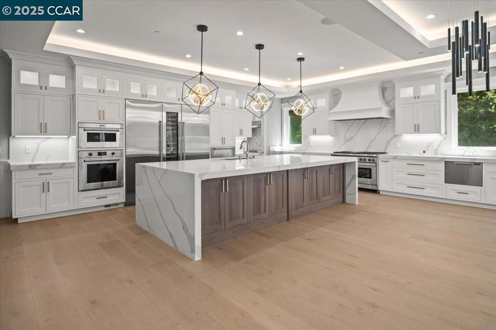 Interior, Kitchen, Pendant Lights, Recessed Lighting, Stainless Steel Appliances, Wood Texture Flooring