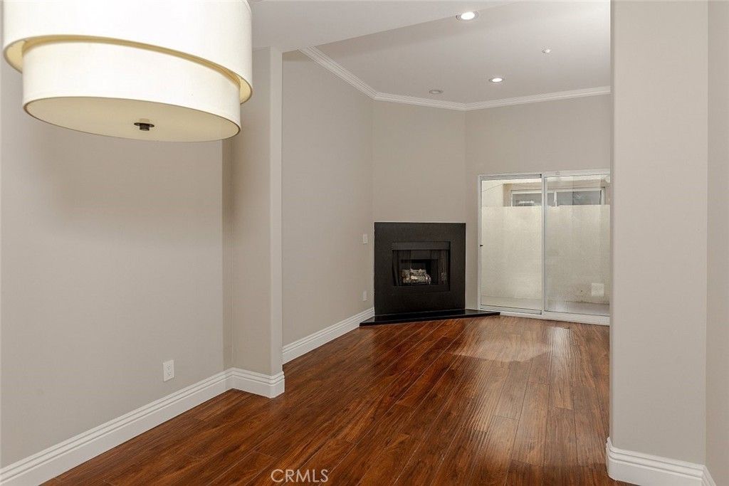 Empty room, Fireplace, Interior, Recessed Lighting, Wood Texture Flooring