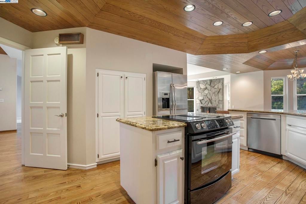Chandelier, Interior, Kitchen, Recessed Lighting, Stainless Steel Appliances, Wooden Ceilings, Wood Texture Flooring