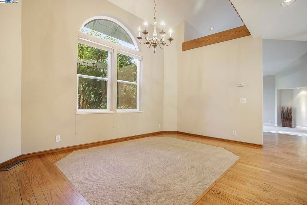 Chandelier, Empty room, Interior, Recessed Lighting, Wooden Beams, Wood Texture Flooring