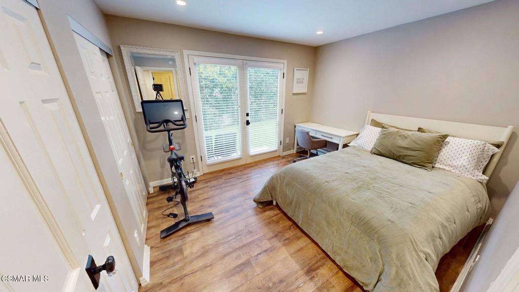 Bedroom, Fitness Equipment, Interior, Recessed Lighting, Wood Texture Flooring