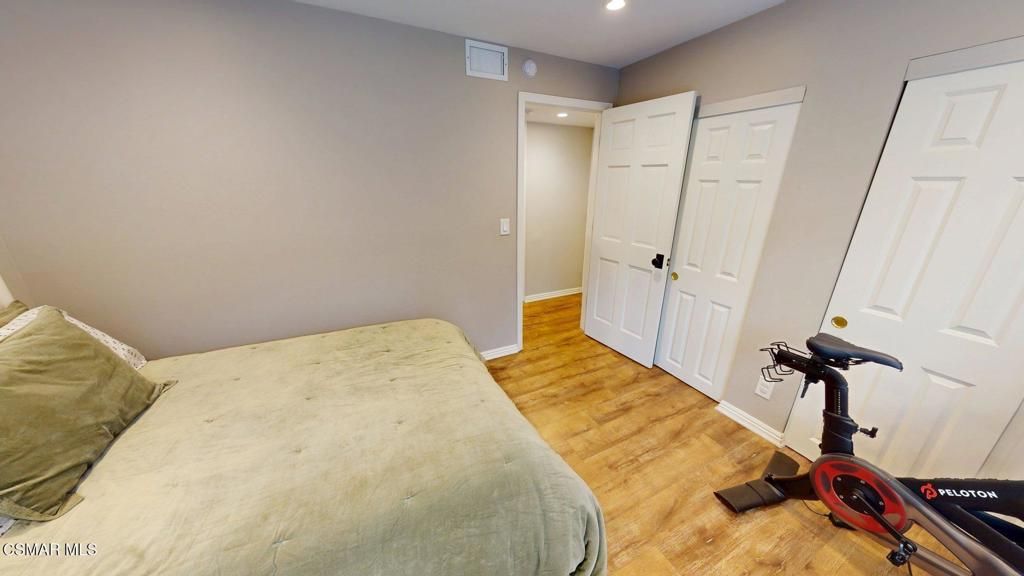 Bedroom, Fitness Equipment, Interior, Recessed Lighting, Wood Texture Flooring