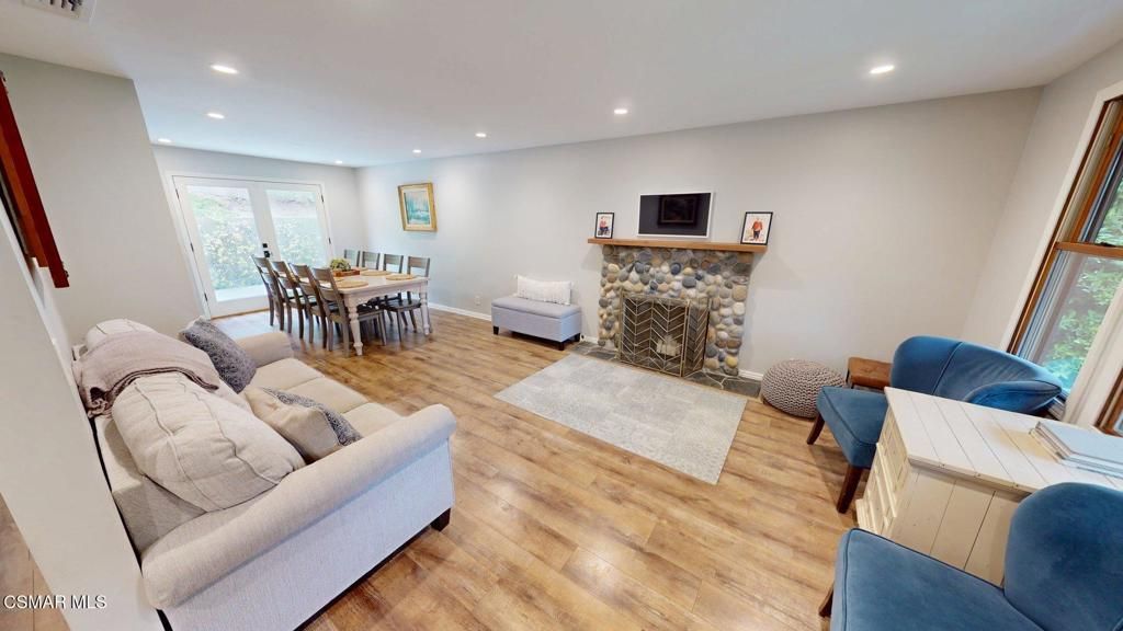 Dining room, Fireplace, Interior, Living room, Recessed Lighting, Wood Texture Flooring