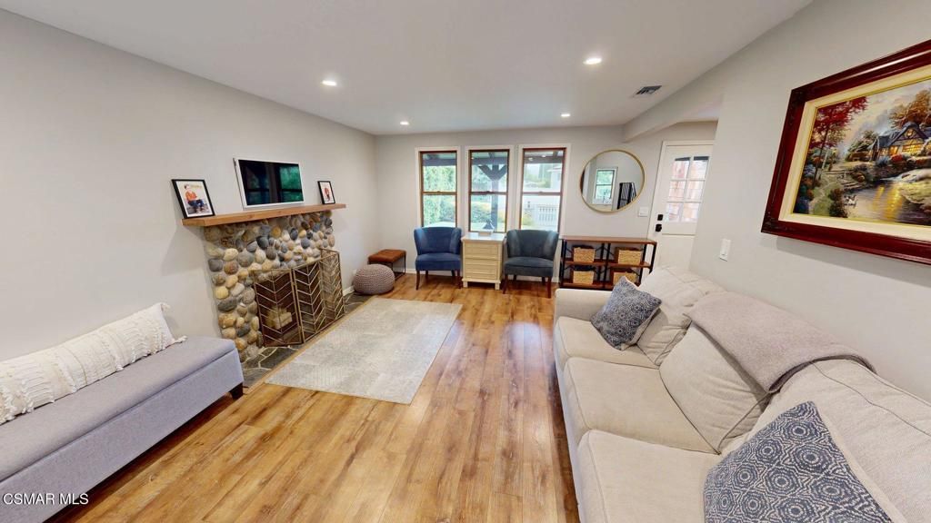 Fireplace, Interior, Living room, Recessed Lighting, Wood Texture Flooring