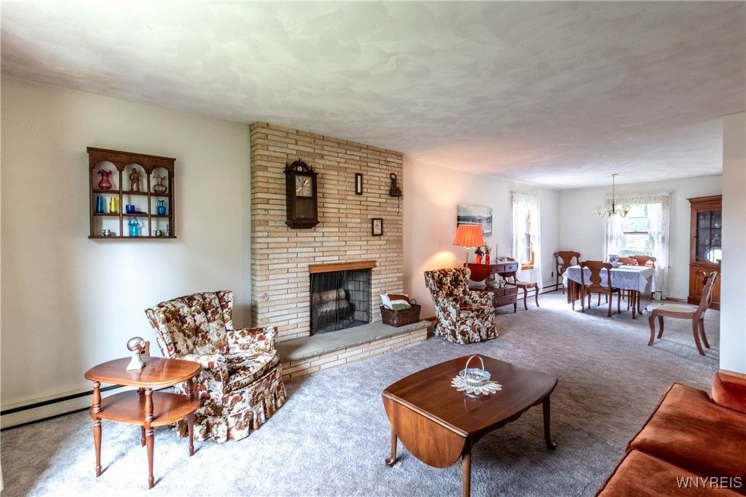 Chandelier, Dining room, Fireplace, Interior, Living room, Pendant Lights, Stone Walls