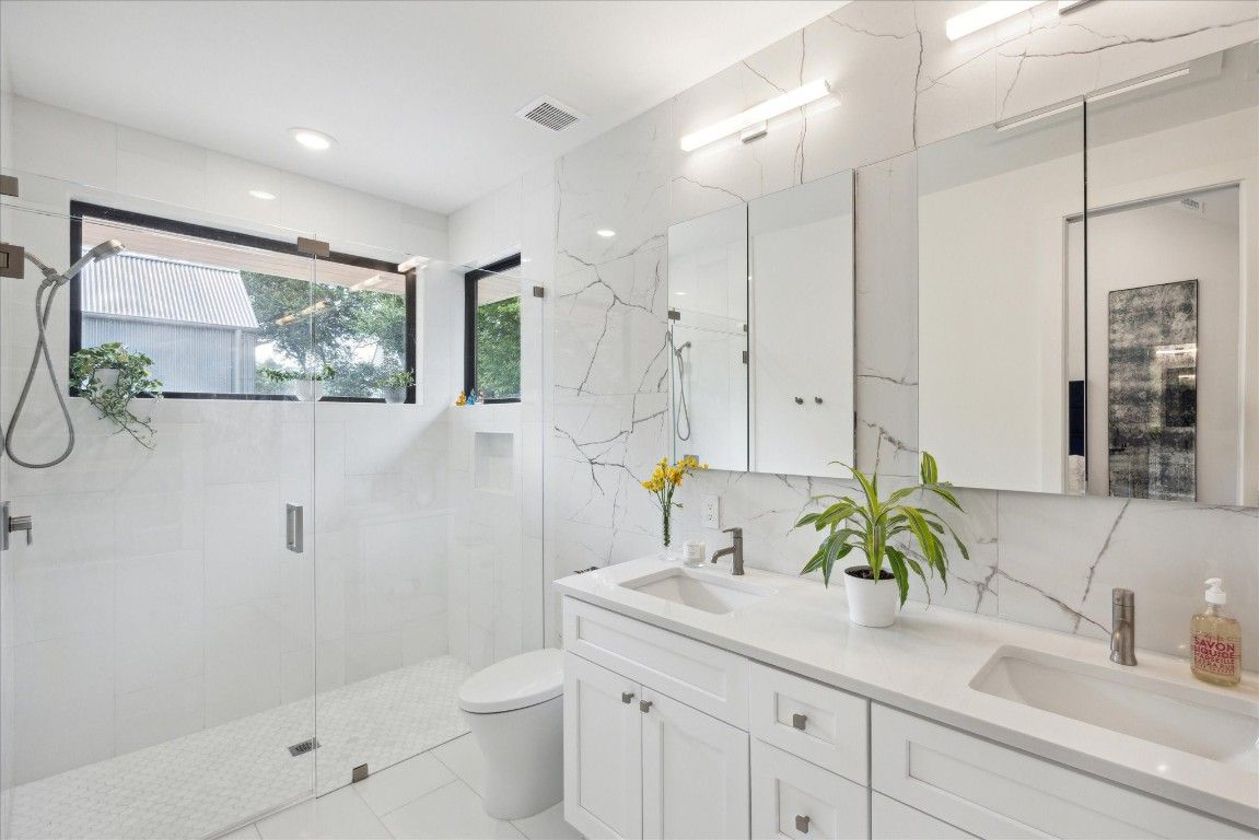 Bathroom, Dual Sink Vanities, Glass Shower, Interior, Marble Walls, Recessed Lighting