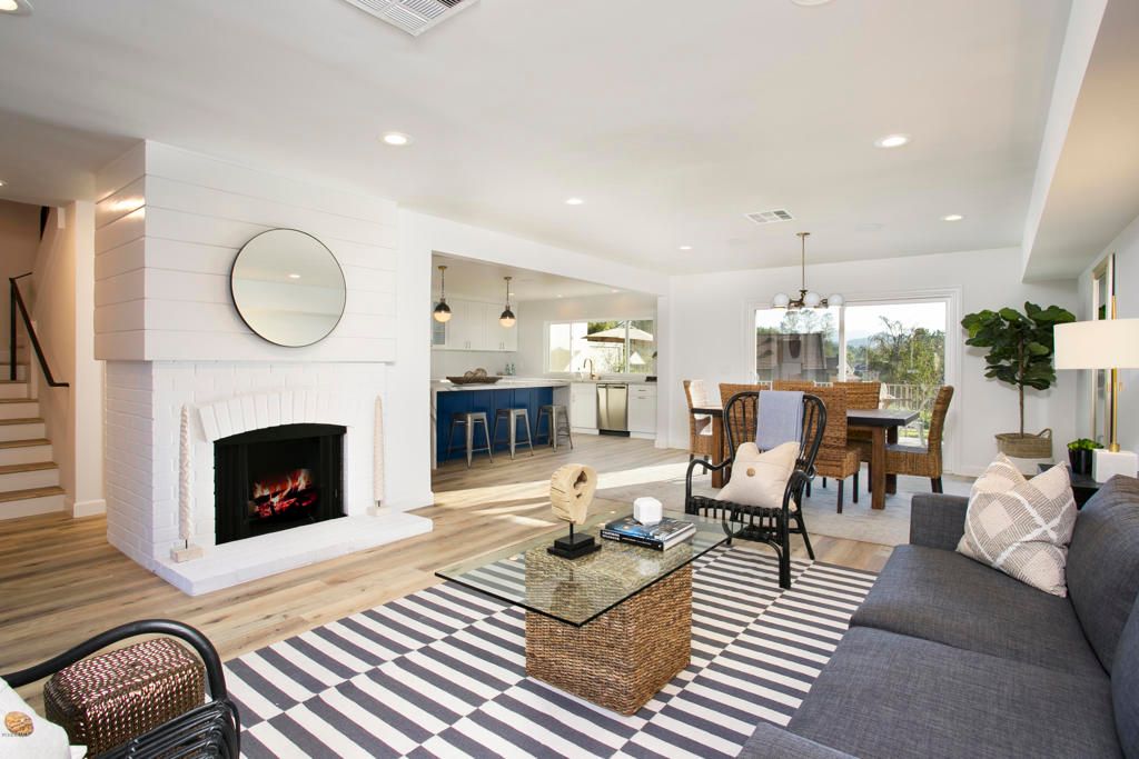 Dining room, Fireplace, Interior, Living room, Pendant Lights, Recessed Lighting, Wood Texture Flooring