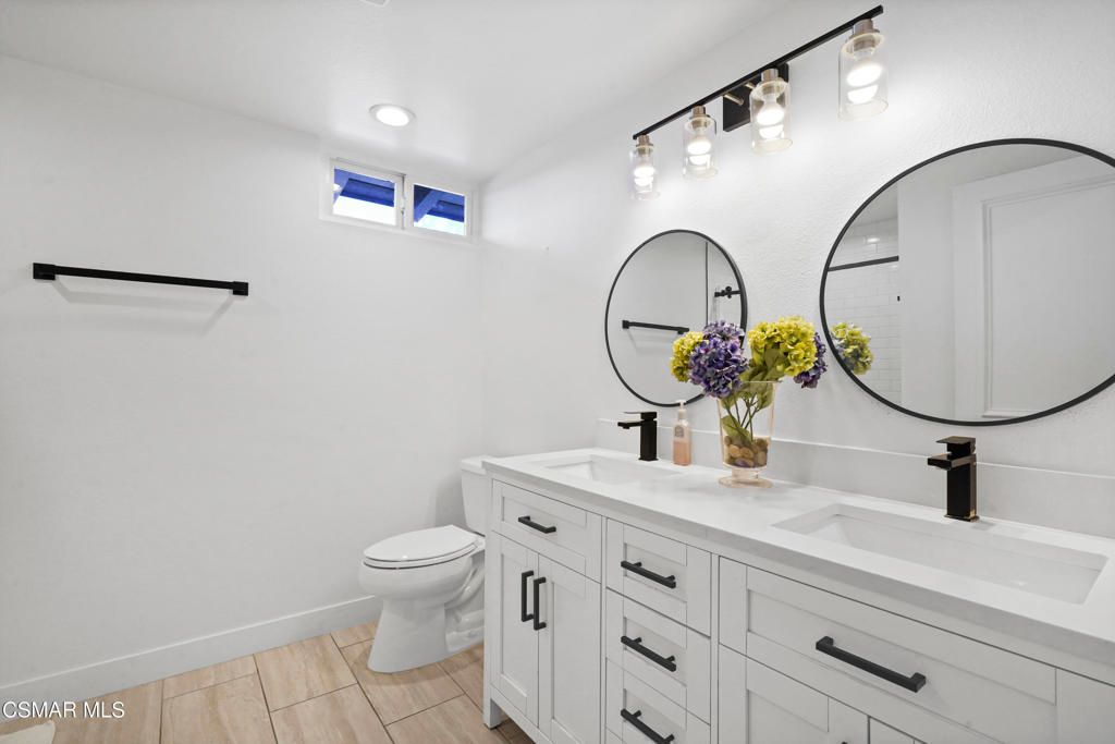 Bathroom, Dual Sink Vanities, Interior, Recessed Lighting, Wood Texture Flooring