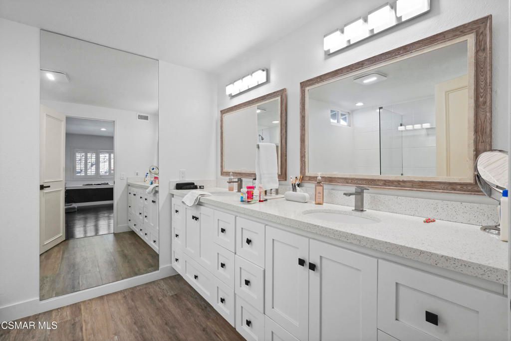 Bathroom, Dual Sink Vanities, Interior, Recessed Lighting, Wood Texture Flooring