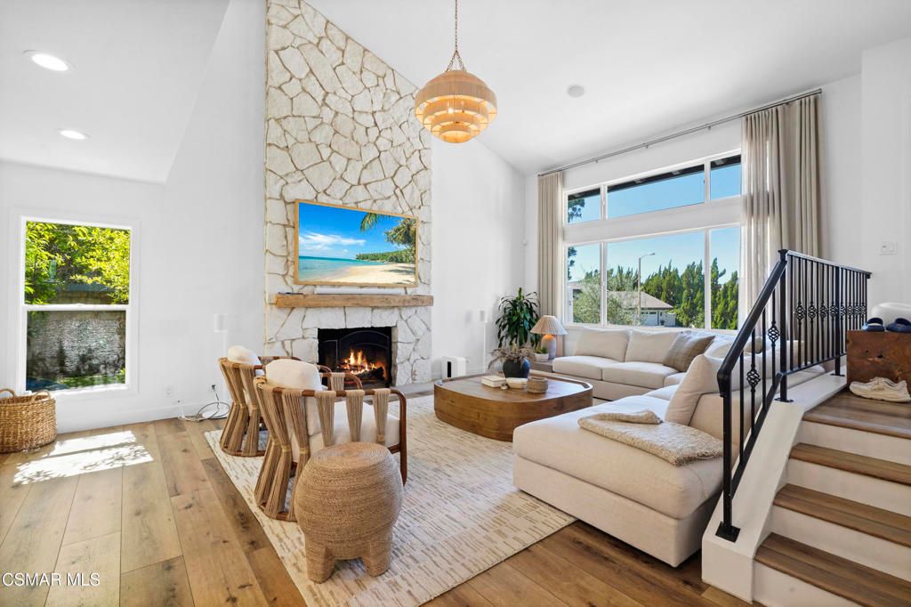 Fireplace, Interior, Living room, Pendant Lights, Recessed Lighting, Stone Walls, Wood Texture Flooring