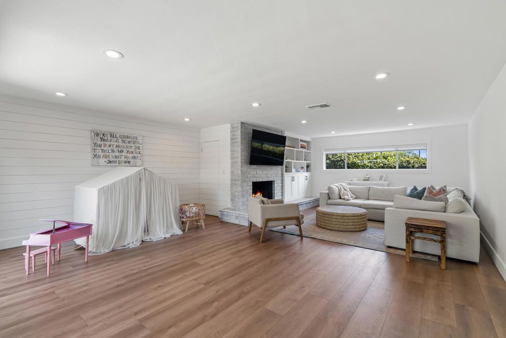 Fireplace, Interior, Living room, Recessed Lighting, Wood Texture Flooring