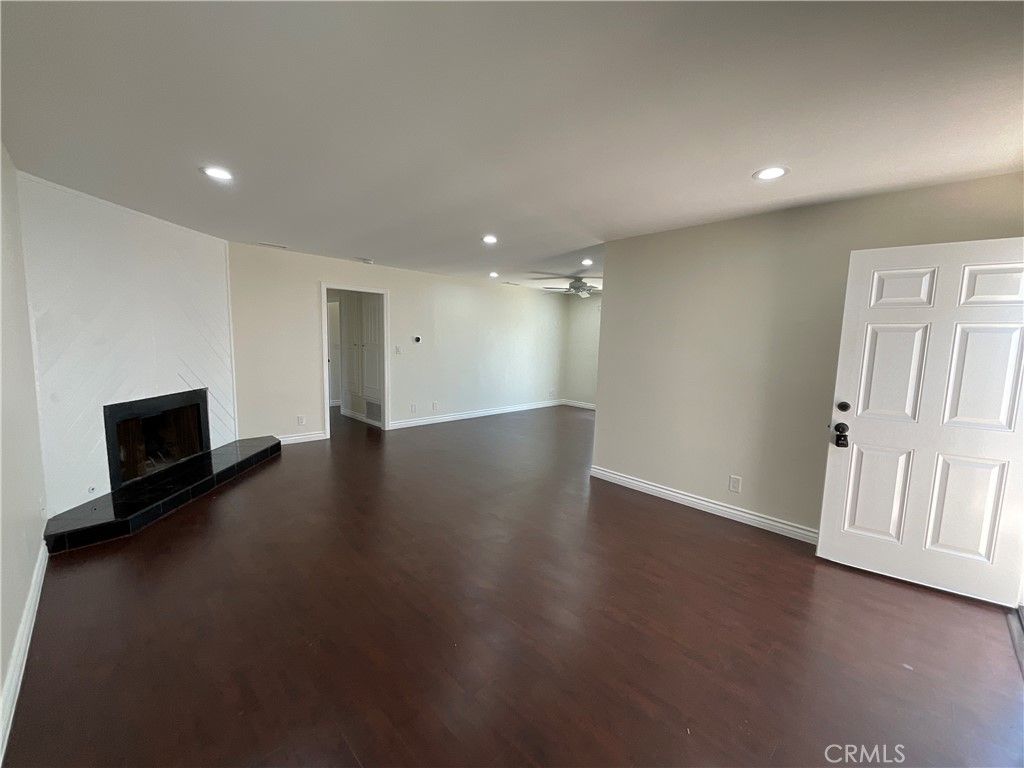 Empty room, Fireplace, Interior, Recessed Lighting, Wood Texture Flooring