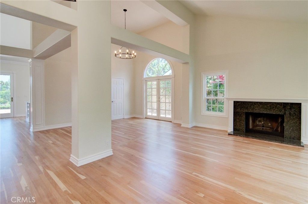 Chandelier, Empty room, Fireplace, Interior, Pendant Lights, Wood Texture Flooring