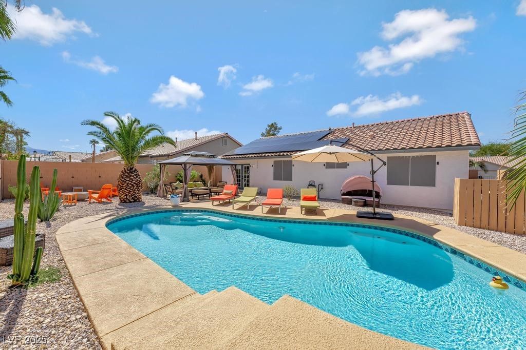 Exterior, Pool, Solar Panels