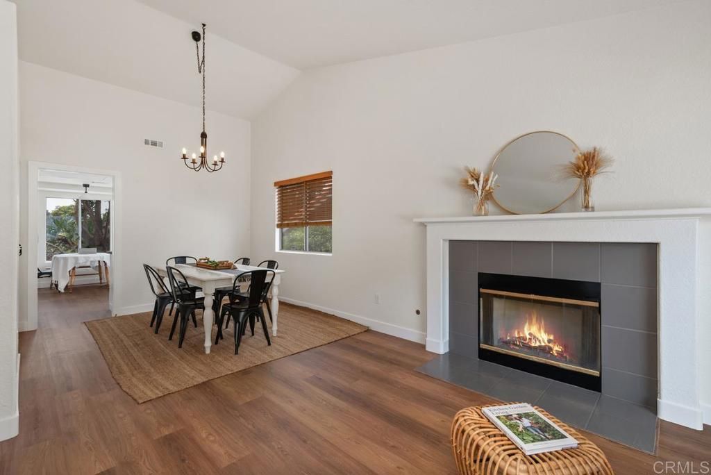 Chandelier, Dining room, Fireplace, Interior, Pendant Lights, Wood Texture Flooring