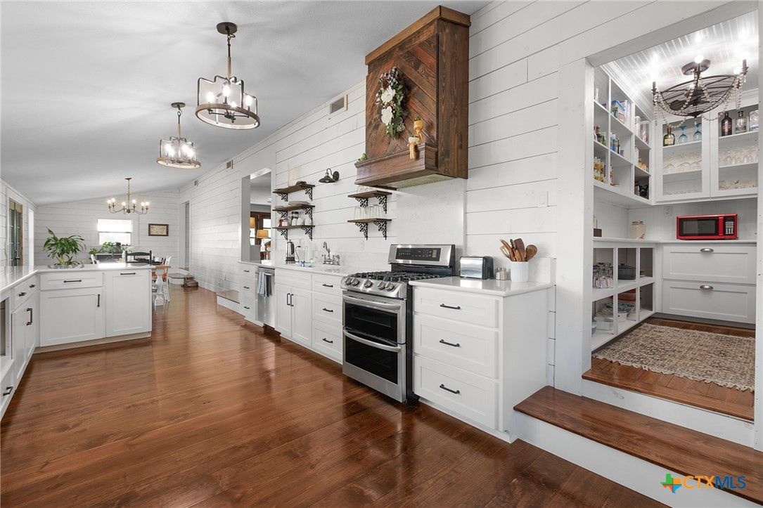 Chandelier, Interior, Kitchen, Pendant Lights, Stainless Steel Appliances, Wood Texture Flooring
