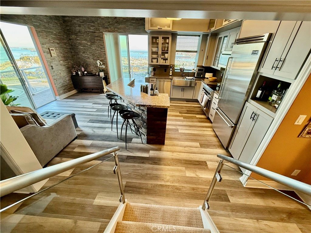 Interior, Kitchen, Stainless Steel Appliances, Stone Walls, Water, Wood Texture Flooring