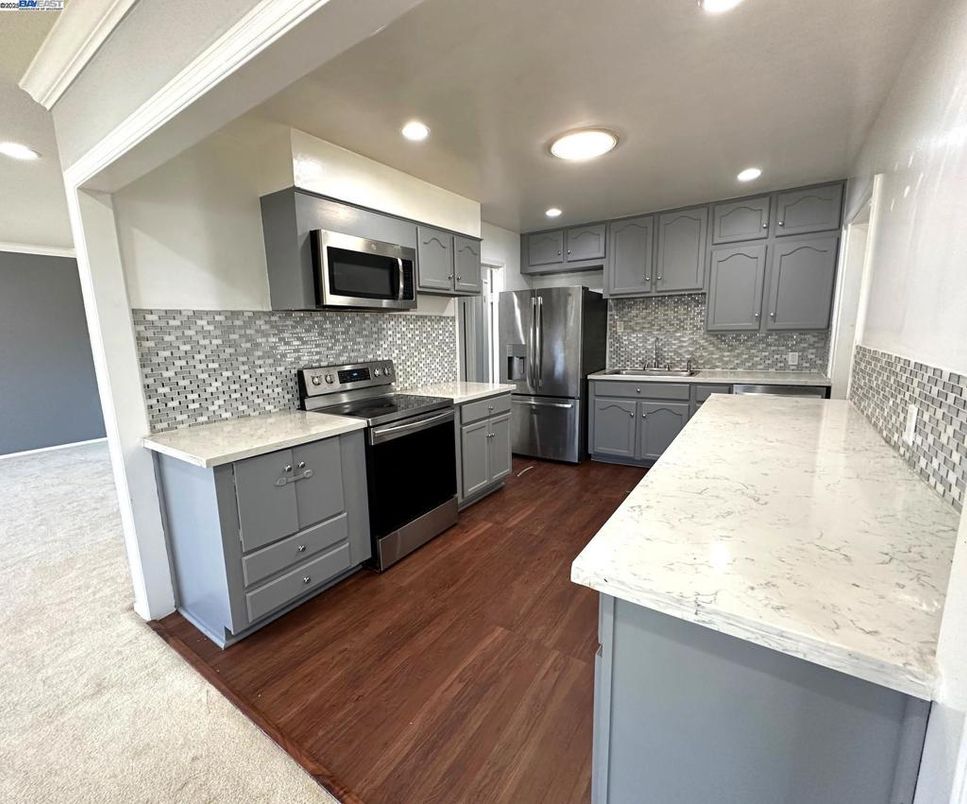 Interior, Kitchen, Recessed Lighting, Stainless Steel Appliances, Wood Texture Flooring