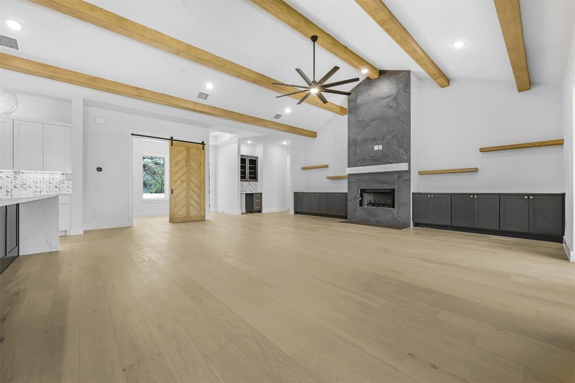 Empty room, Fireplace, Interior, Recessed Lighting, Wooden Beams, Wood Texture Flooring