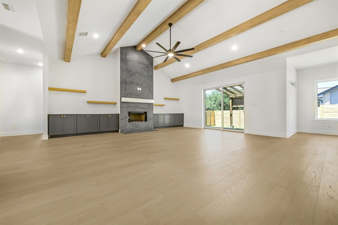 Empty room, Fireplace, Interior, Recessed Lighting, Wooden Beams, Wood Texture Flooring