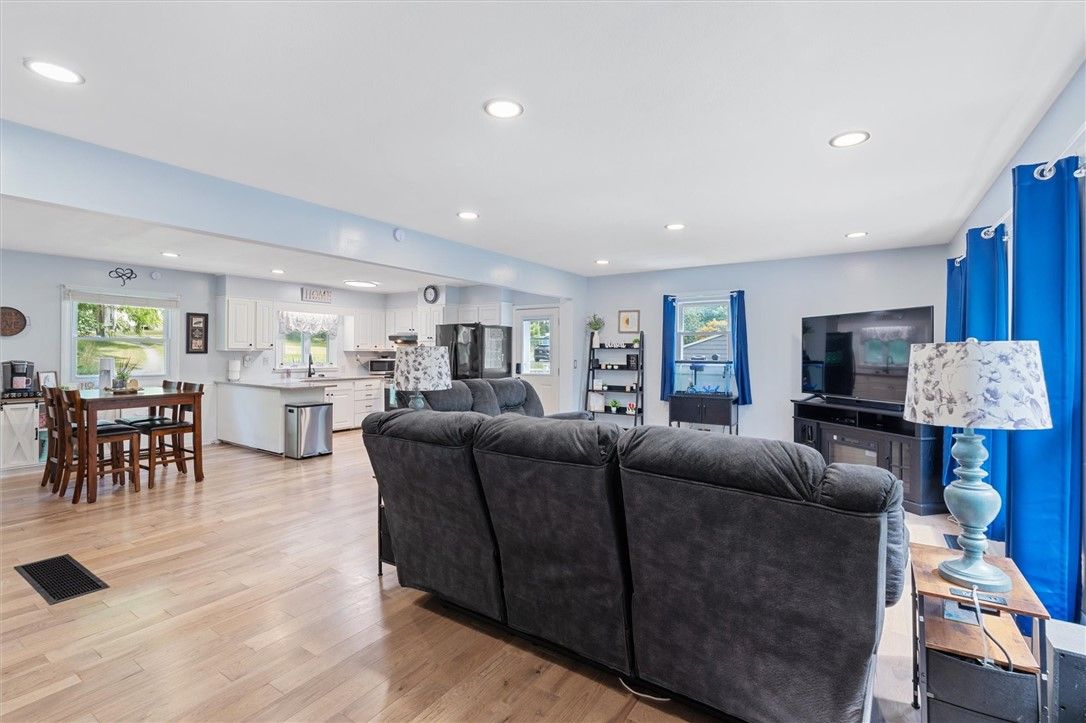 Dining room, Interior, Kitchen, Living room, Recessed Lighting, Stainless Steel Appliances, Wood Texture Flooring