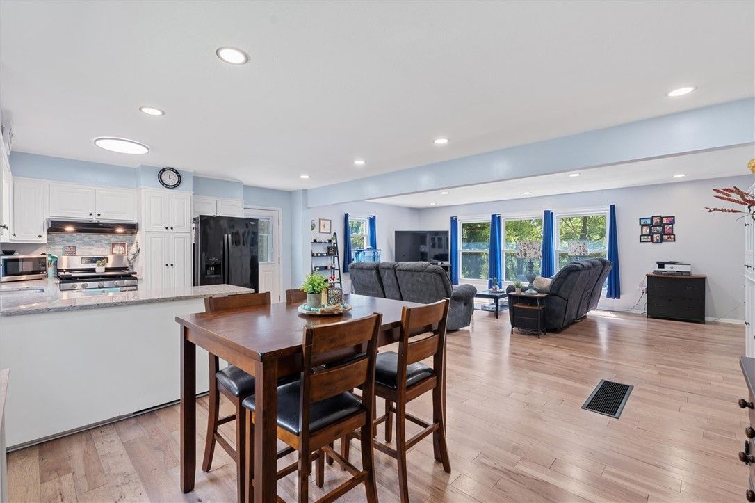 Dining room, Interior, Kitchen, Living room, Recessed Lighting, Stainless Steel Appliances, Wood Texture Flooring