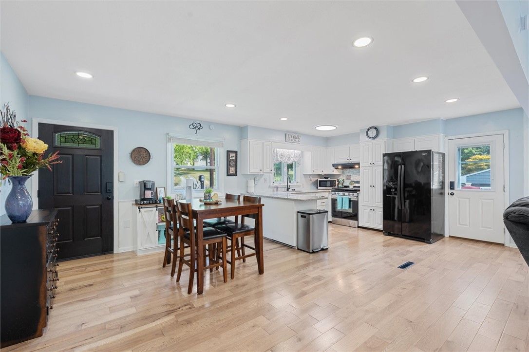Dining room, Interior, Kitchen, Recessed Lighting, Stainless Steel Appliances, Wood Texture Flooring