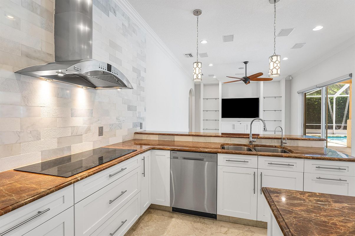 Interior, Kitchen, Pendant Lights, Recessed Lighting, Stainless Steel Appliances, Stone Walls