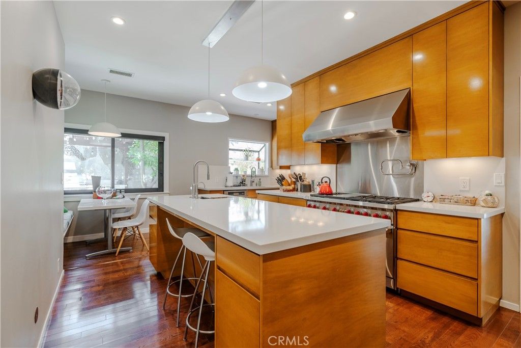 Dining room, Interior, Kitchen, Pendant Lights, Recessed Lighting, Stainless Steel Appliances, Wood Texture Flooring