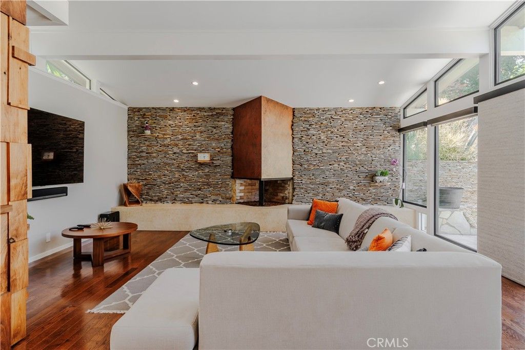 Fireplace, Interior, Living room, Recessed Lighting, Stone Walls, Wood Texture Flooring