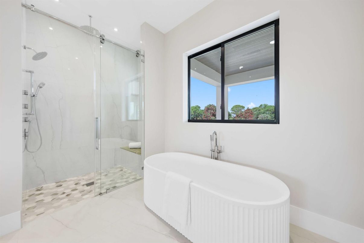 Bathroom, Free Standing Baths, Glass Shower, Interior, Marble, Marble Walls, Recessed Lighting